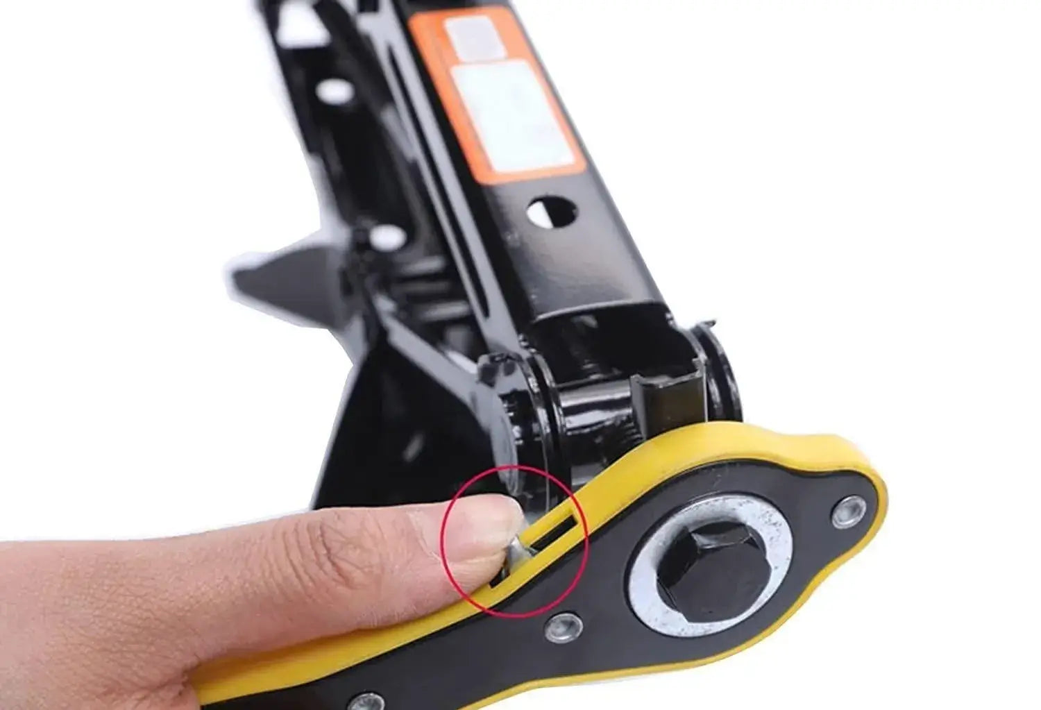 Close-up of a car jack with a hand pointing to a small component on a white background