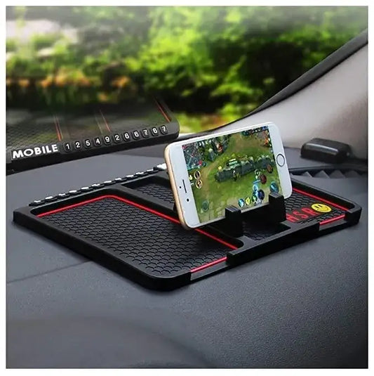 Phone holder on a car dashboard with a phone displaying a game.
