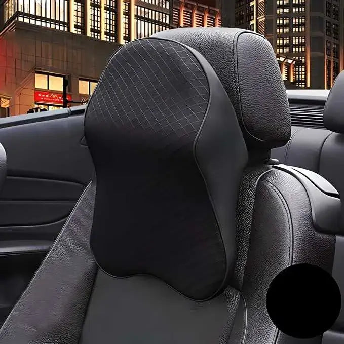 Memory foam car neck pillow providing ergonomic support in a luxury car setting.