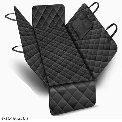 Set of black quilted car seat covers on a white background