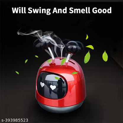 Mini Robot Car Perfume-Red humidifier with steam and leaves on a black background