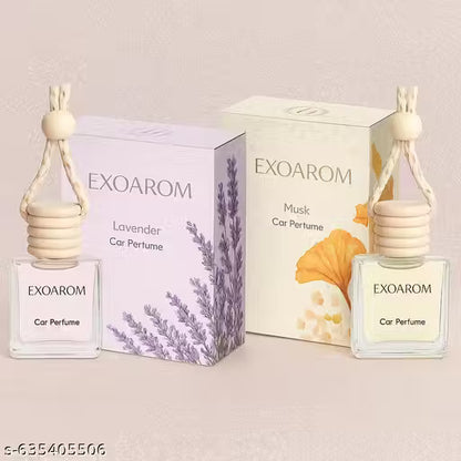 Two EXOAROM car perfume bottles with their packaging on a light background